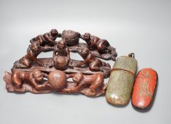 Two Chinese Qing spectacle cases, 19cm, and three hardwood carvings of boys