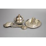 A sterling miniature sombrero and three other items, including candle snuffers and purse