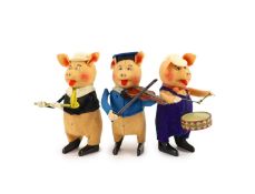 A set of three Schuco tinplate and felt clockwork pig musicians, pre war, tallest 11.5cm