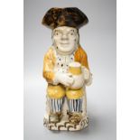 A large George III Prattware 'Good Hearty Fellow' Toby jug, c.1790-1800, height 26.5cm (restored).