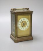A French brass carriage clock with repeat, 18.5 cm high with the handle up