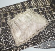 A vintage 1920's silver mesh evening bag, a black evening shawl woven with silver thread, length