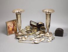 Sundry silver including a pair of spill vases, napkin rings, teaspoons sent bottle etc.