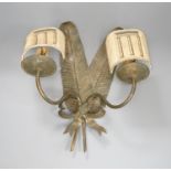 A pair of two branch ‘feather quill’ wall sconces, height 35cm