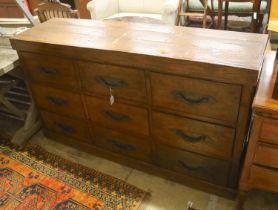 A modern hardwood nine-drawer chest, width 158cm, depth 46cm, height 91cm