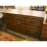 A modern hardwood nine-drawer chest, width 158cm, depth 46cm, height 91cm