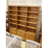 A mid century walnut open bookcase cupboard, length 186cm, depth 30cm, height 220cm