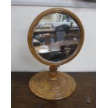A Victorian gentleman’s telescopic walnut shaving mirror, with a stepped circular base, plate