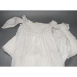 A pair of cutwork and filet pillow cases, two christening gowns, crochet cloth etc