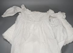 A pair of cutwork and filet pillow cases, two christening gowns, crochet cloth etc