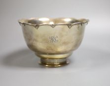 A Tiffany & Co sterling bowl with removable pierced insert(drainer?), diameter 19.5cm, 22.5oz.