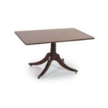 A Regency rectangular mahogany tilt top dining table, width 130cm, depth 80cm, height 72cm