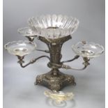 A George IV Old Sheffield plate four branch epergne decorated with scallop shell and acanthus scroll
