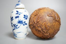 A Chinese blue and white jar and cover, Kangxi period, height 12cm and a Chinese ball