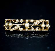 An early 20th century yellow metal and seed pearl set rectangular bar brooch, 38mm,gross 6.1 grams.