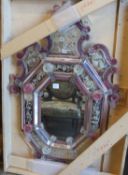 A Venetian etched pink and clear glass wall mirror with octagonal plate, (damage) width 84cm, height