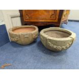 A pair of Compton terracotta poppy pattern planters, diameter 34cm, height 19cm