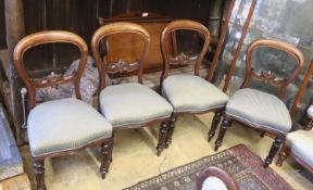 A set of four Victorian mahogany balloon back dining chairs (damage)