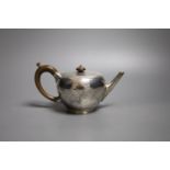 A George V silver bullet shaped teapot, Thomas Bradbury & Sons, London, 1913, gross 13.5oz.