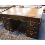 A late Victorian mahogany pedestal desk, length 138cm, depth 76cm, height 76cm