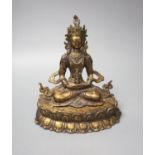 A seated bronze figure of a Bodhisattva, 20cm