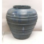 A large blue glazed terracotta pot 53cm