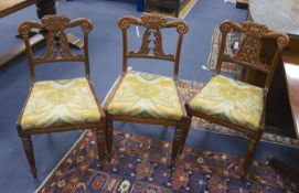 Attributed to Gillows of Lancaster. A set of six Regency rosewood dining chairswith scroll carved