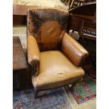 An early 20th century French tan leather club chair, width 78cm, depth 66cm, height 88cm