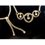 Two modern 14k and diamond chip set necklaces, gross weight 7.7 grams.