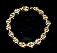 A modern 9ct gold oval link bracelet, 17.5cm,6.4 grams,.