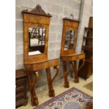 A pair of 19th century Italian mahogany pier tables with mirrors, width 72cm, depth 42cm, height