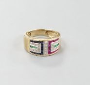 A modern 9ct gold, emerald, ruby, sapphire and diamond set geometric dress ring, size Q, gross