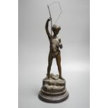 A bronze figure of a young fisherman, height 44cm