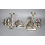 A group of assorted silver including two hip flasks, two spill vases, condiments, vesta cases,