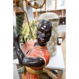 A large Blackamoor composition seven branch figural candelabrum, 195cm