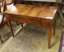 A 19th century Continental walnut rectangular tea table with folding top, (cut down), width 89cm,