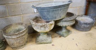 Four assorted reconstituted stone garden urns and a galvanised tub