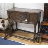 A 17th century panelled oak side cupboard, length 97cm, depth 48cm, height 91cm