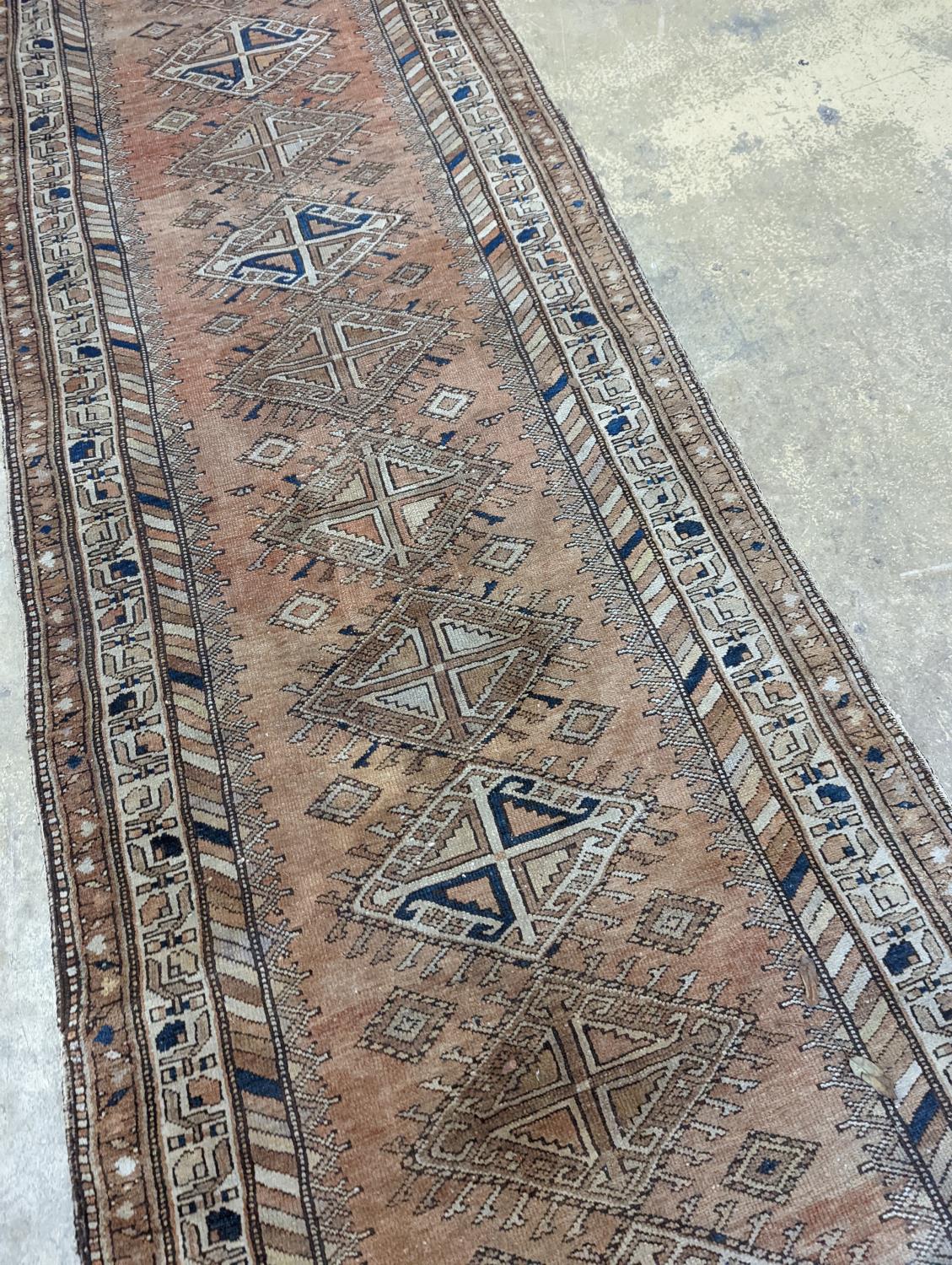 An antique Caucasian red ground runner, 372 x 106cm - Image 4 of 7