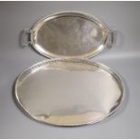 A late 19th century Hanau? embossed white metal oval dish, decorated with battle scene, 49cm, 24.