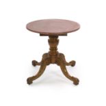 A Victorian scagliola walnut and faux porphyry marble circular centre table, diameter 74cm, height