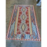 A Kelim flat weave carpet, 140 x 210cm