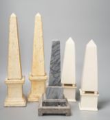 Two pairs of simulated stone obelisks, another pair and a single, tallest 33cm
