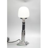 An Art Deci chrome and glass lamp