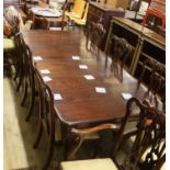 A set of eight George III style mahogany dining chairs with ball and claw feet together with a