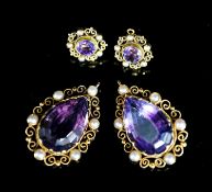 A pair of yellow metal and split pearl mounted pear cut amethyst pendants, 35mm and a pair of