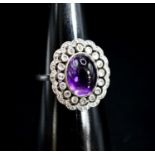 A 1920's white metal, cabochon amethyst and rose cut diamond ring, size M, gross weight 5.9 grams.