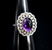 A 1920's white metal, cabochon amethyst and rose cut diamond ring, size M, gross weight 5.9 grams.