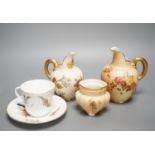 A Worcester bird painted cup and saucer, a blush ivory jug and pot and an ivory jug