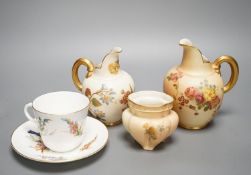 A Worcester bird painted cup and saucer, a blush ivory jug and pot and an ivory jug